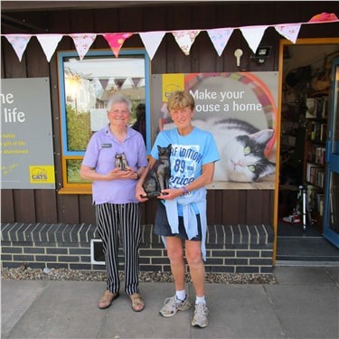 Two volunteers celebrating 45 years of dedication