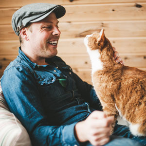 Man with ginger cat