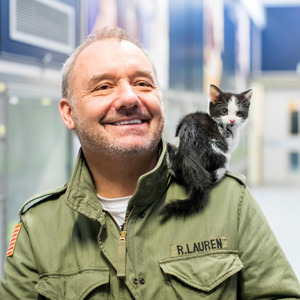 Black and white kitten on Bob Mortimer's shoulder