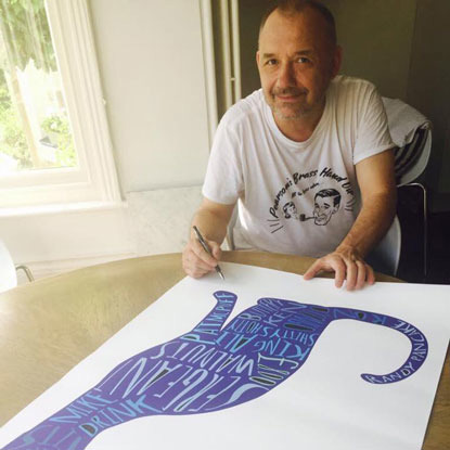 Bob Mortimer signing a cat art print