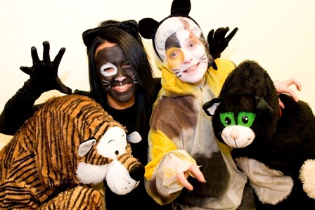 two women in cat costumes