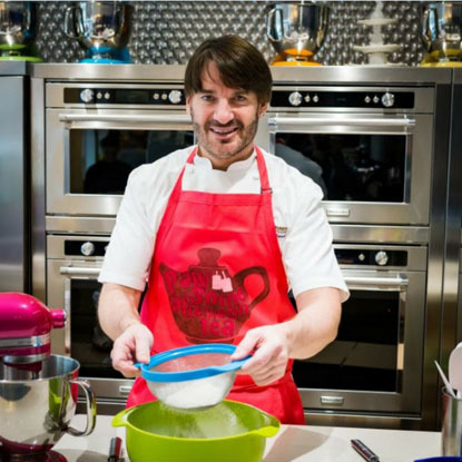 Eric Lanyard baking for Pawsome Afternoon Tea