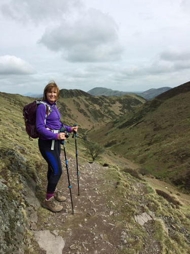 woman walking along the Long Mynd in Shropshire