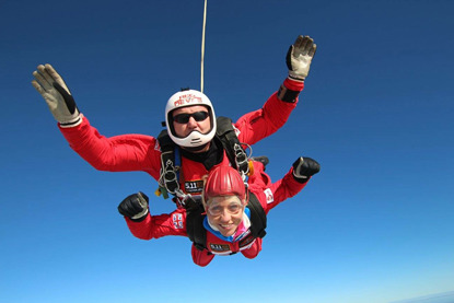 woman and man skydiving