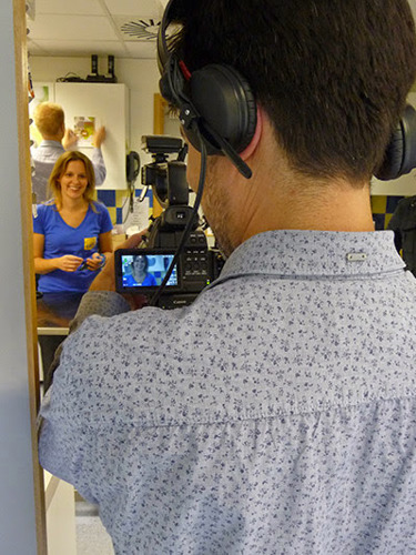 Man filming woman at Cats Protection vet surgery