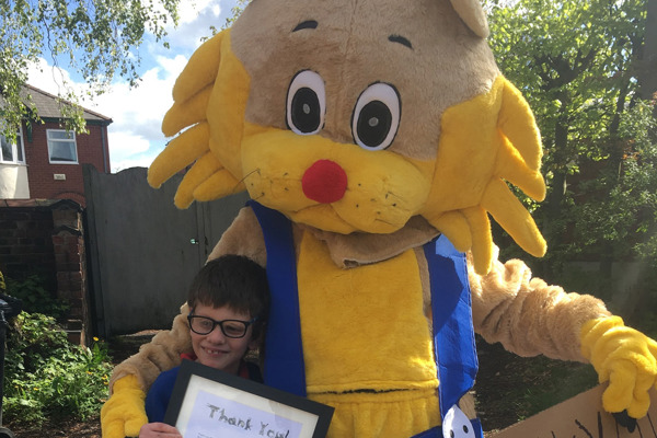 Young boy hosts storytime for cats to raise funds